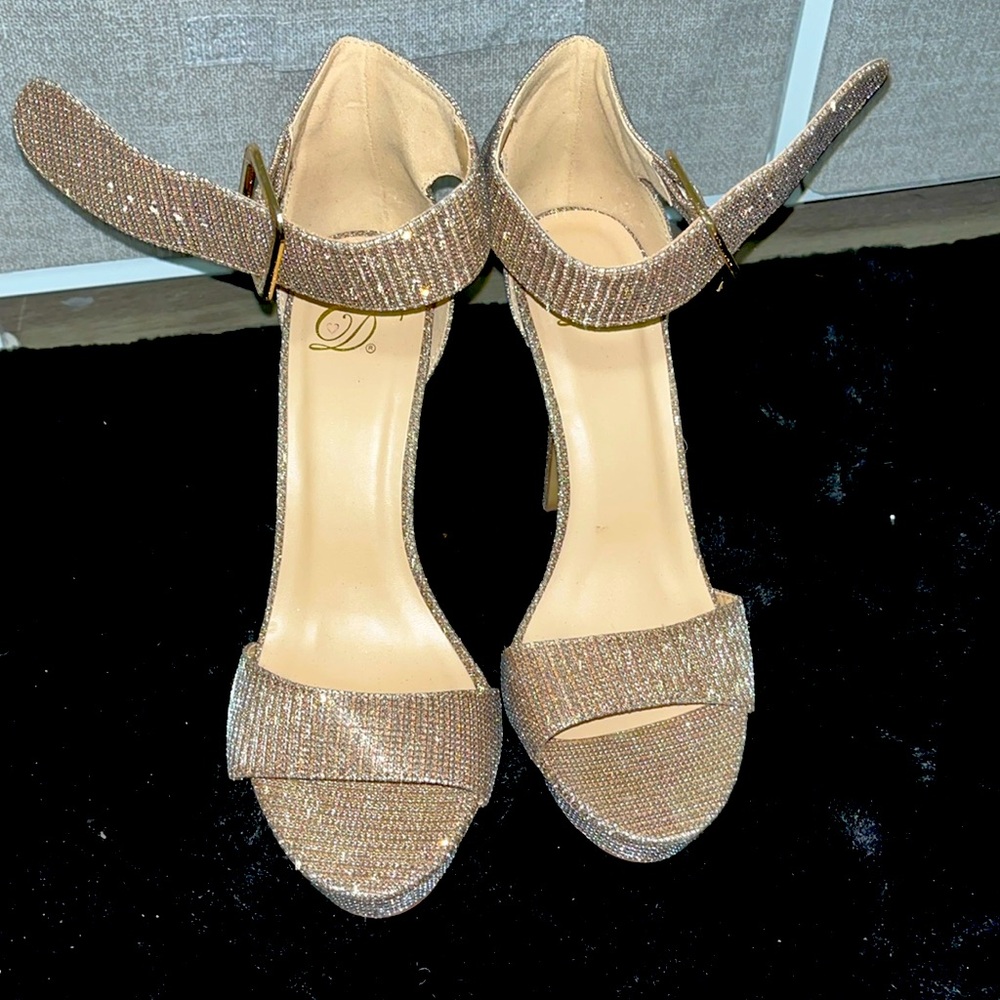 Shimmery gold-ish heel worn once